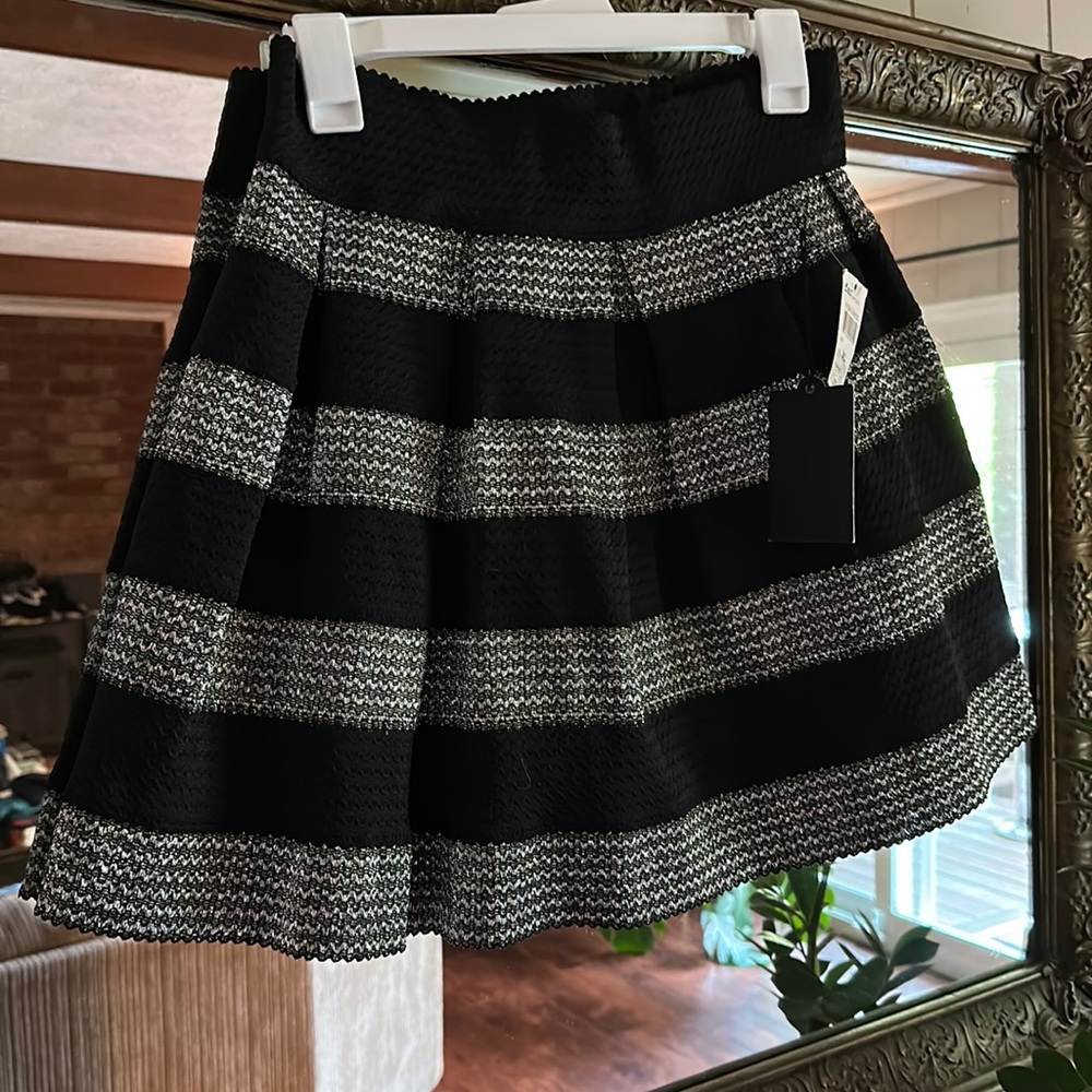 Juniors size dressy skirt! Black and silver stretch.